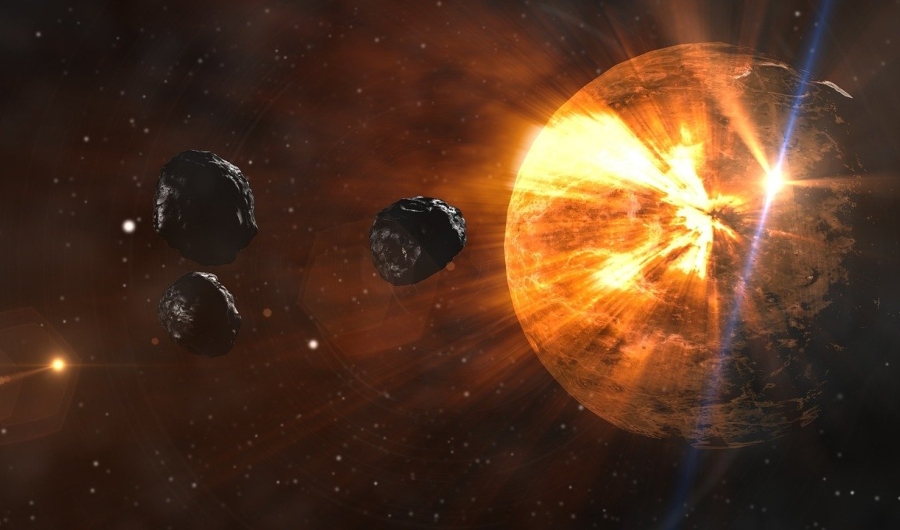 Imagen de asteroides acercándose a una estrella.