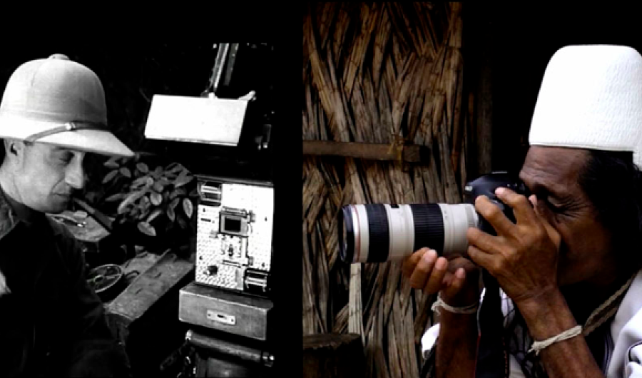 Explorador con cámara de video e indígena con cámara de Fotos