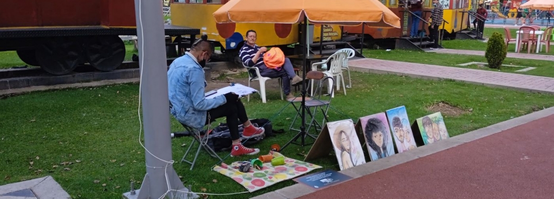 Dibujantes de Arte a la KY en calle del Parque de los Novios
