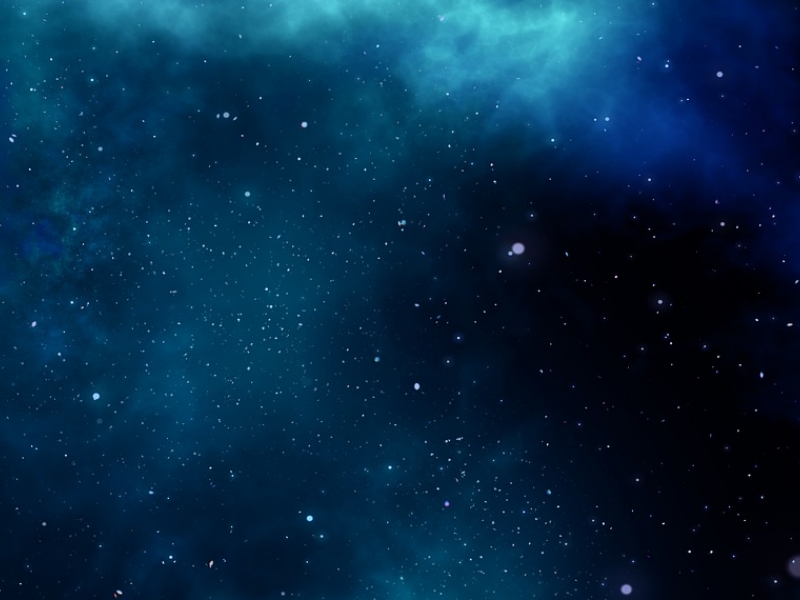 Estrellas en una nube azul en el espacio. 