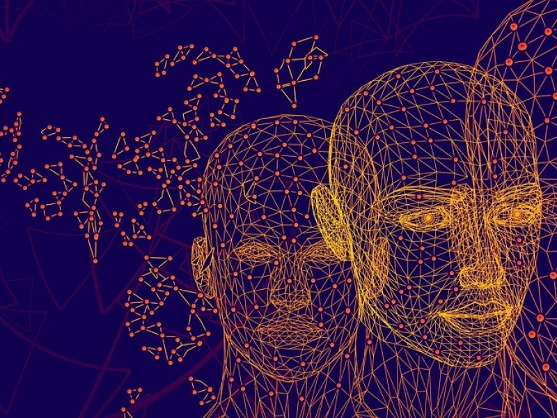 Caras simuladas en naranja con fondo morado. 