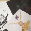 Tres ejercicios plásticos realizados en papel acuarela sobre una mesa